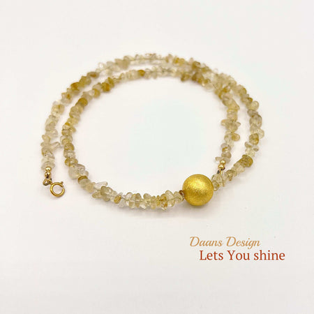 Handgemaakte-edelsteen-ketting-gouden-bal