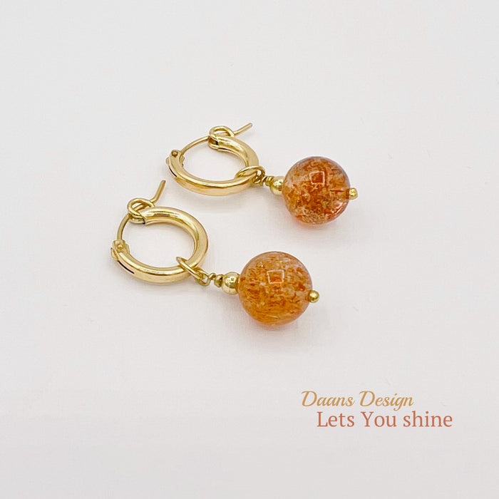 Earrings with Sunstone charms