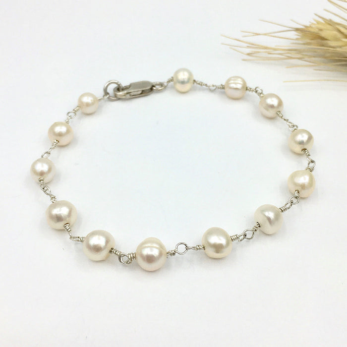 Perlenarmband aus runden Perlen aus Sterlingsilber